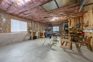 Basement featuring a workshop area