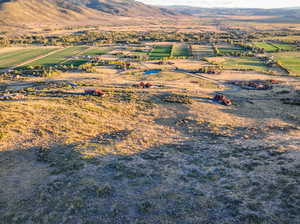 Birds eye view of property featuring a rural view