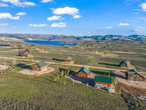 Birds eye view of property featuring a mountain view and a rural view