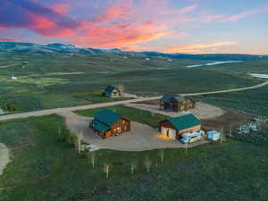 Aerial view at dusk with a rural view and a mountain view