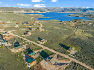 Bird's eye view with a water and mountain view