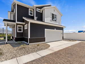 View of front of property with a garage