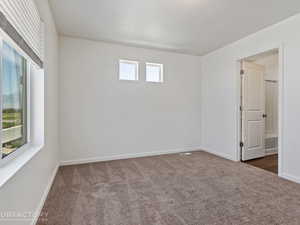 View of carpeted spare room