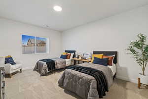 Bedroom featuring carpet flooring