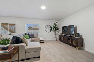 Living room with light colored carpet