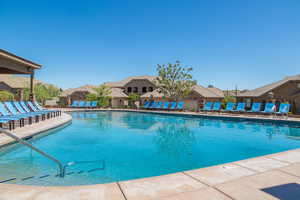 View of swimming pool featuring a patio