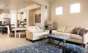 Living room with light tile flooring