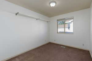 Spare room with carpet flooring