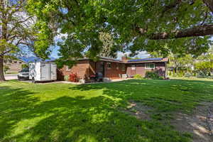 View of yard with rv parking