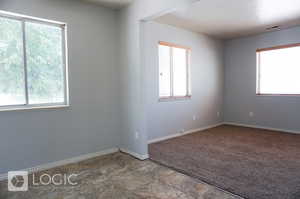 View of carpeted spare room