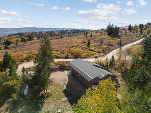 View of subject property featuring a mountain backdrop