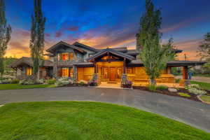 Craftsman inspired home featuring a lawn