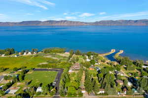 Bird's eye view with a water and mountain view