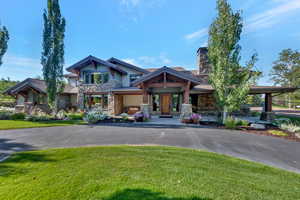 View of front of house featuring a front lawn