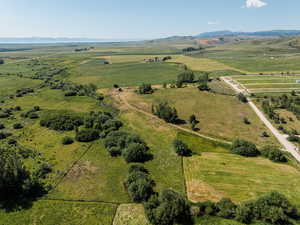 Birds eye view of property with a rural view