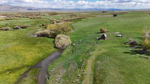 Drone / aerial view featuring a mountain view and a rural view