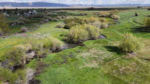 Bird's eye view with a water and mountain view