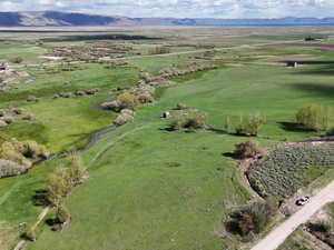 Drone / aerial view featuring a rural view and a mountain view