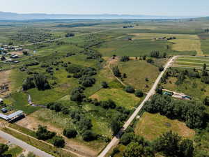 Birds eye view of property with a rural view