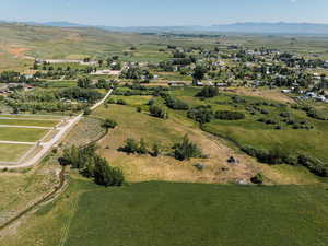 Drone / aerial view featuring a mountain view and a rural view