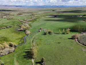 Drone / aerial view featuring a rural view and a mountain view