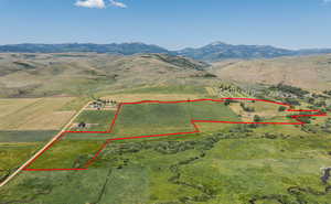 Aerial view featuring a mountain view and a rural view