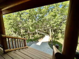 Front porch leads to charming path.