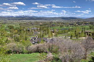 Drone Aerial View of the Golf Course & Mountains Beyond