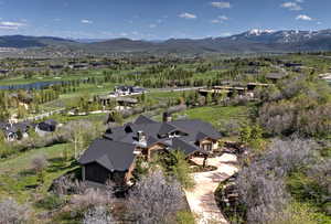 Bird's eye view of the Golf Course, Pond & Mountains Beyond