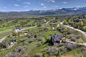 Bird's Eye View Featuring the Ski Mountains, Golf Course and Valley Beyond