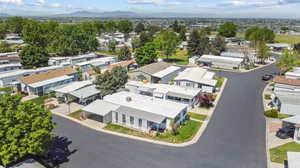 Birds eye view of property featuring a mountain view