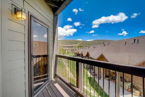 Balcony featuring a mountain view