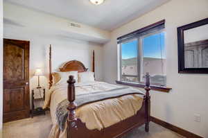 View of carpeted bedroom