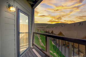 View of balcony at dusk