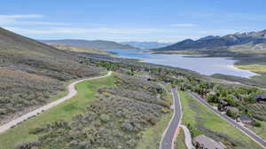 Bird's eye view with a water and mountain view