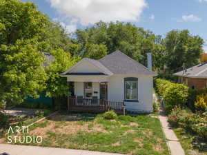 Bungalow featuring covered porch