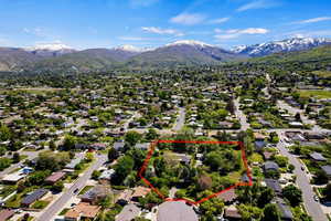 Aerial view with a mountain view and outlined lot