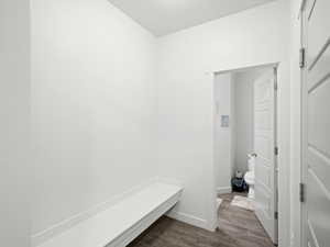 Mudroom featuring wood-type flooring