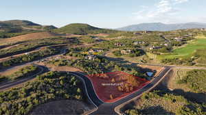 Birds eye view of property featuring a mountain view