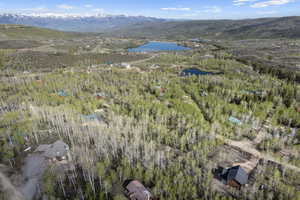 Aerial view with a water and mountain view