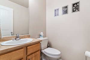 Bathroom with vanity and toilet