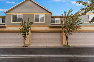 View of property with a garage