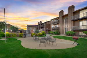 View of nearby features featuring a patio area and a yard