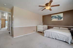 Bedroom with carpet floors and ceiling fan