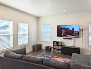 Living room featuring dark hardwood / wood-style floors