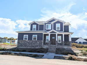 View of front of home with covered porch