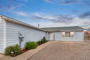 View of front of house with a patio