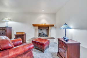 Primary bedroom with fireplace and sitting area