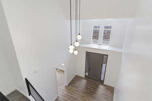 Entryway with wood-type flooring