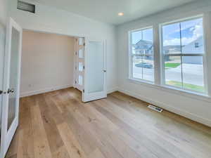 Empty room featuring light hardwood / wood-style floors